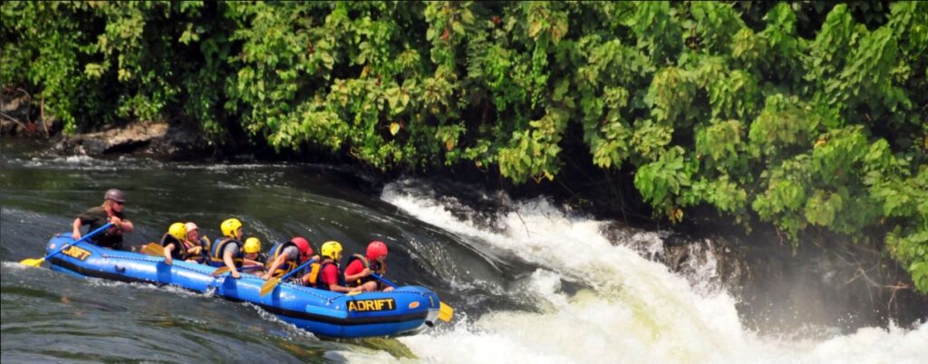 Adventurers rafting the Nile River during 2 Days Jinja Water Rafting tour in Uganda